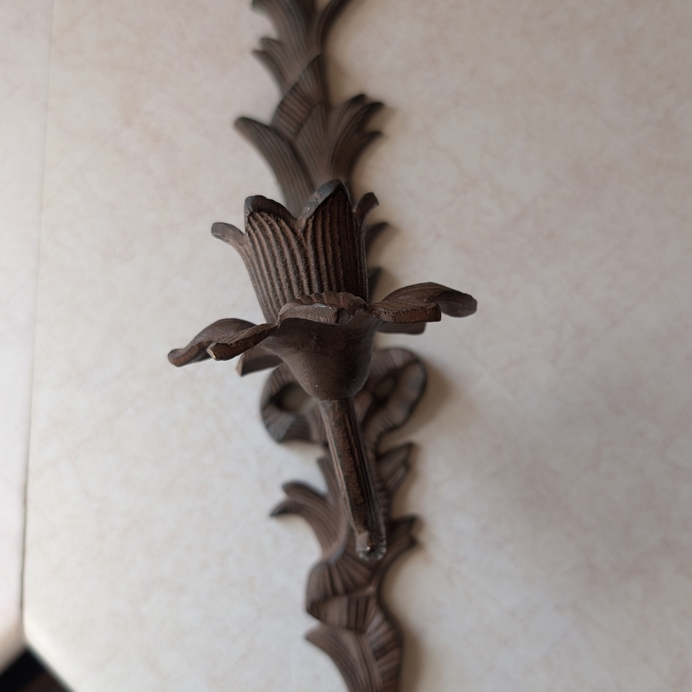 Cast iron wall sconce